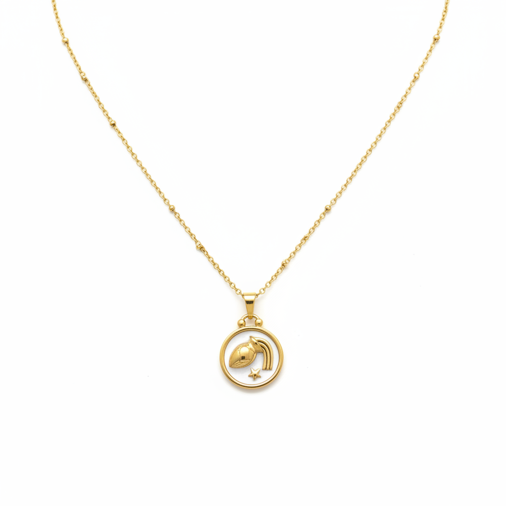 Collar dorado con dije de pájaro